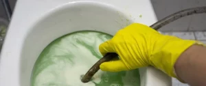 fix a clogged toilet without a plunger