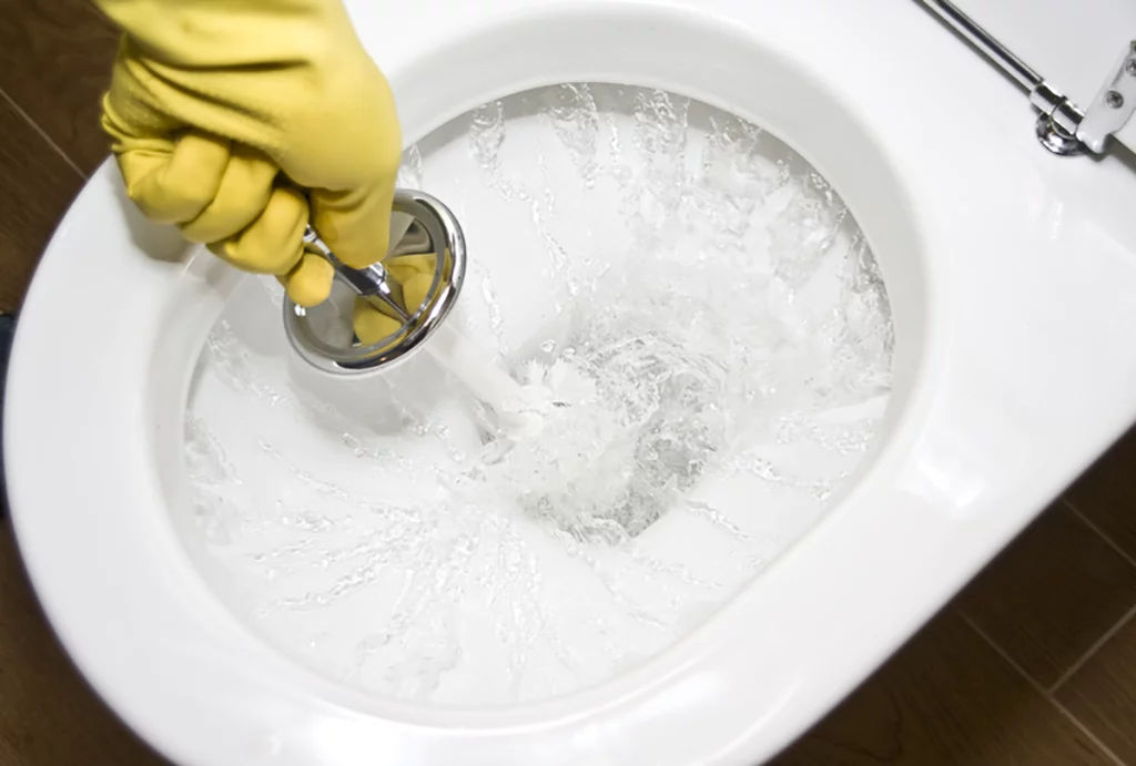 how to fix a clogged toilet without a plunger