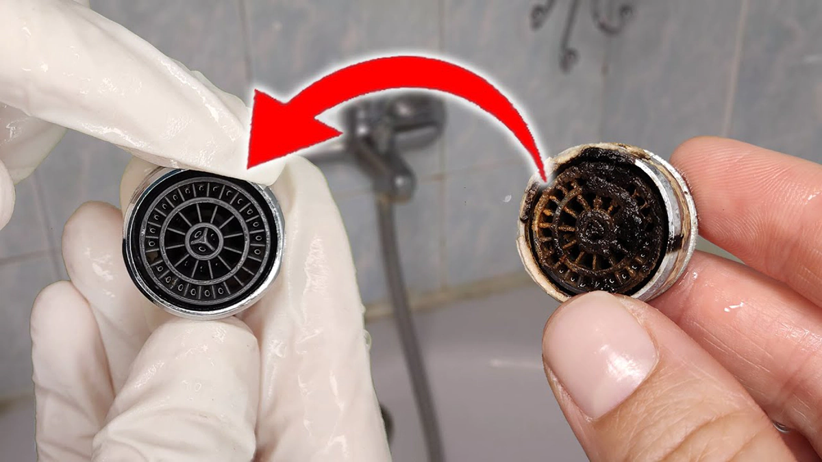 Checking bathroom faucet aerator for sediment causing low water pressure