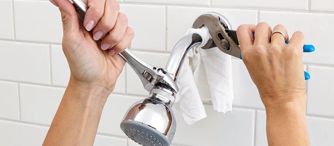 changing shower head arm
